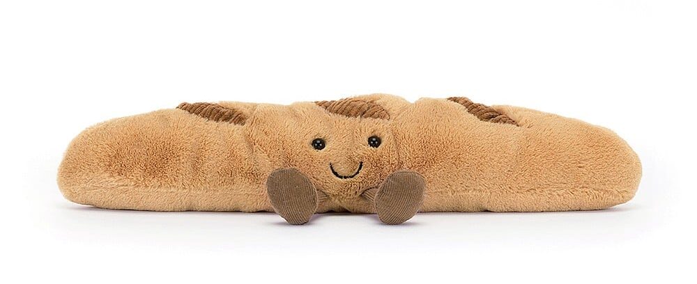 An image of a jellycat shaped like a baguette 